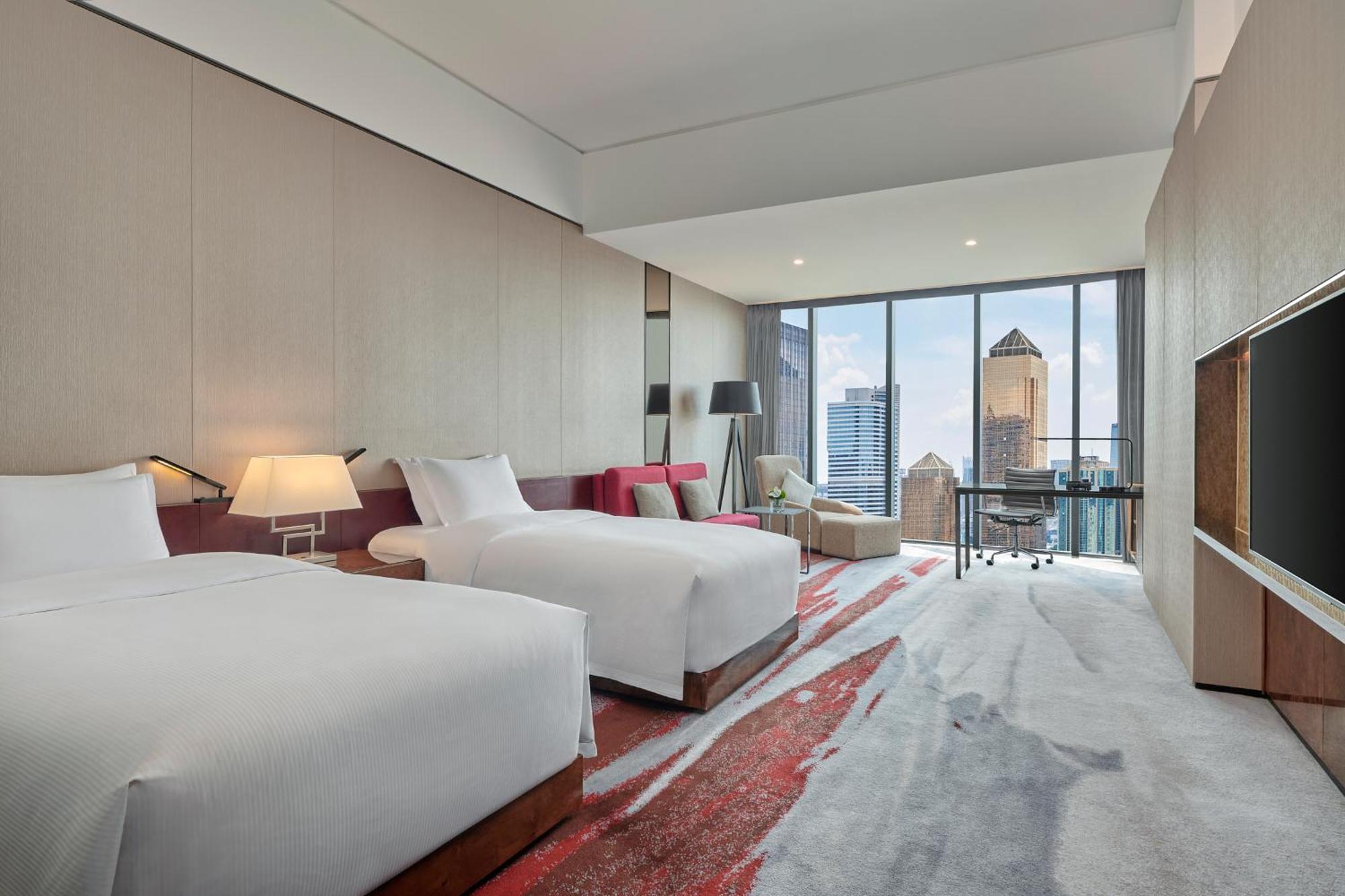 Hilton Guangzhou Tianhe - Free Shuttle Bus And Registration Counter Available During Canton Fair Period Exteriér fotografie Deluxe Room
